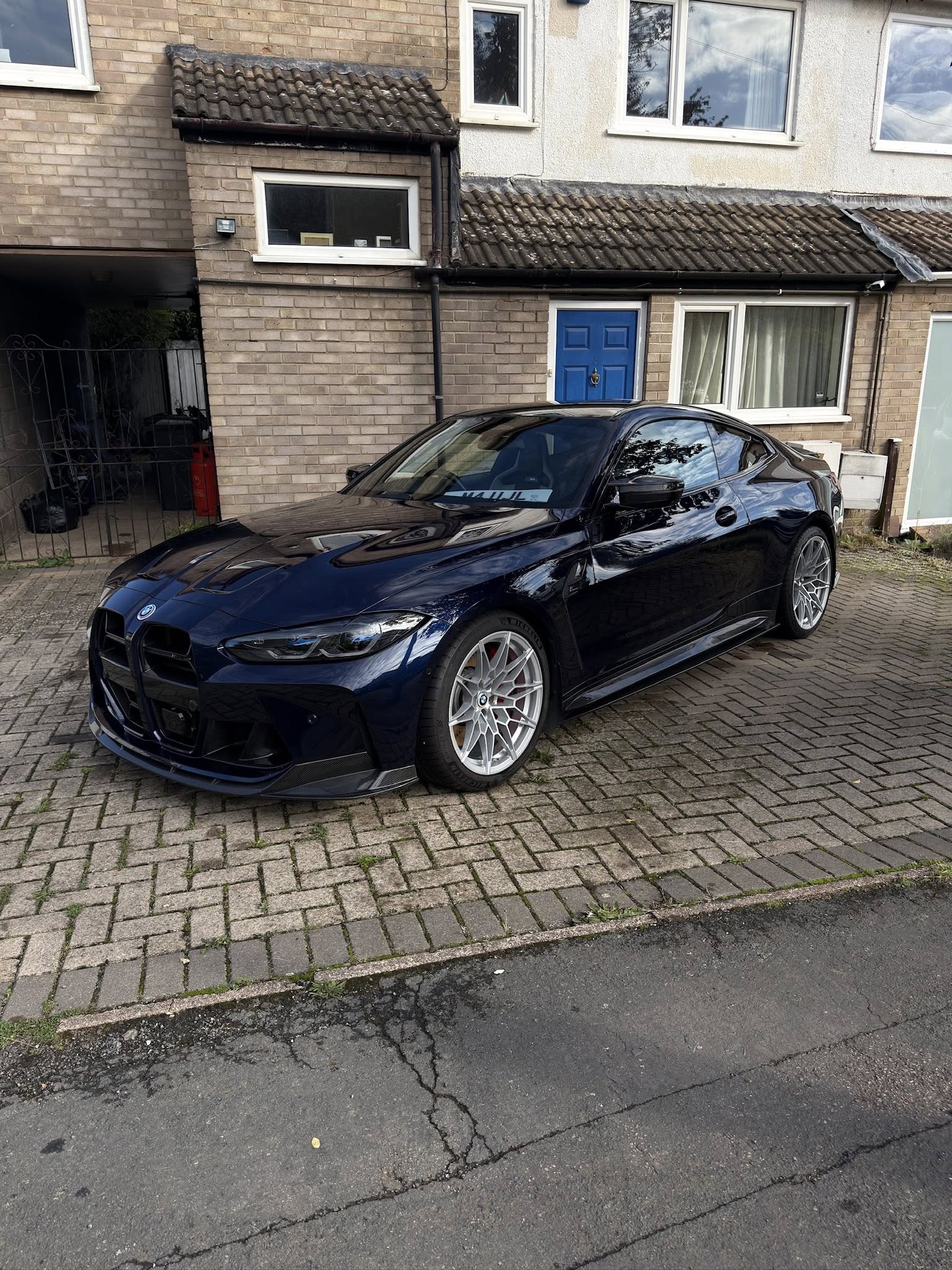 BEFORE — BMW M4 Competition gunmetal alloy wheel covered in heavy brake dust. Professional wheel detail and deep clean in Loughborough, Leicestershire.
